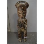 Balue Carved Wooden Seated Male Figure with Bead Decoration