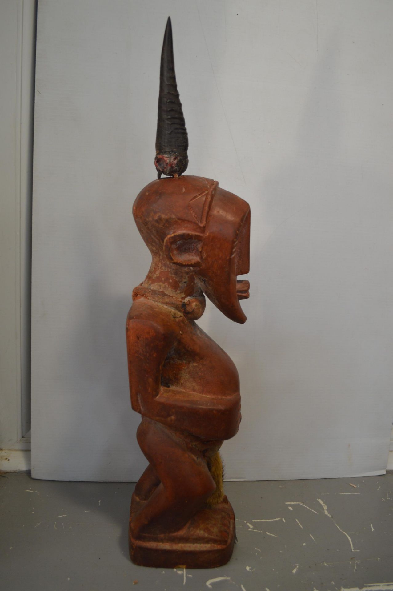 African Carved & Painted Wooden Fertility Figure with Horn and Fur Adornments - Image 4 of 4