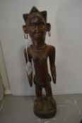 Senufo Carved Wooden Tribal Figure with Beaded and Metal Decoration