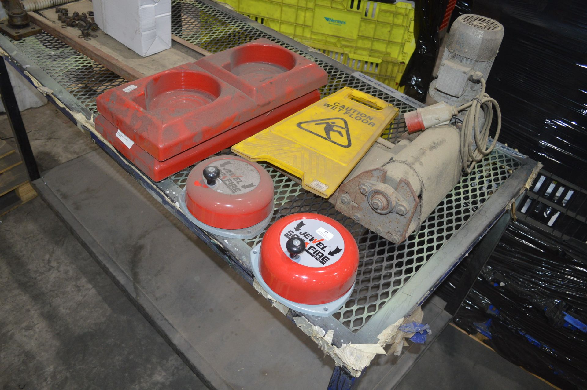 *Two Double Fire Point Extinguisher Stands, Two Rotary Fire Bells, and a Caution Wet Floor Sign