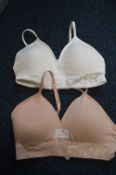 *DKNY Seamless Bras (white, and peach) Size: M 2pk