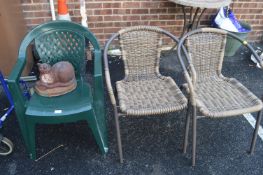 Three Garden Chairs and a Metal Cat