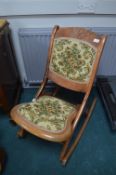 Carved Folding Rocking Chair with Floral Upholster