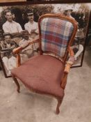 * carved upholstered queen Anne wooden chair