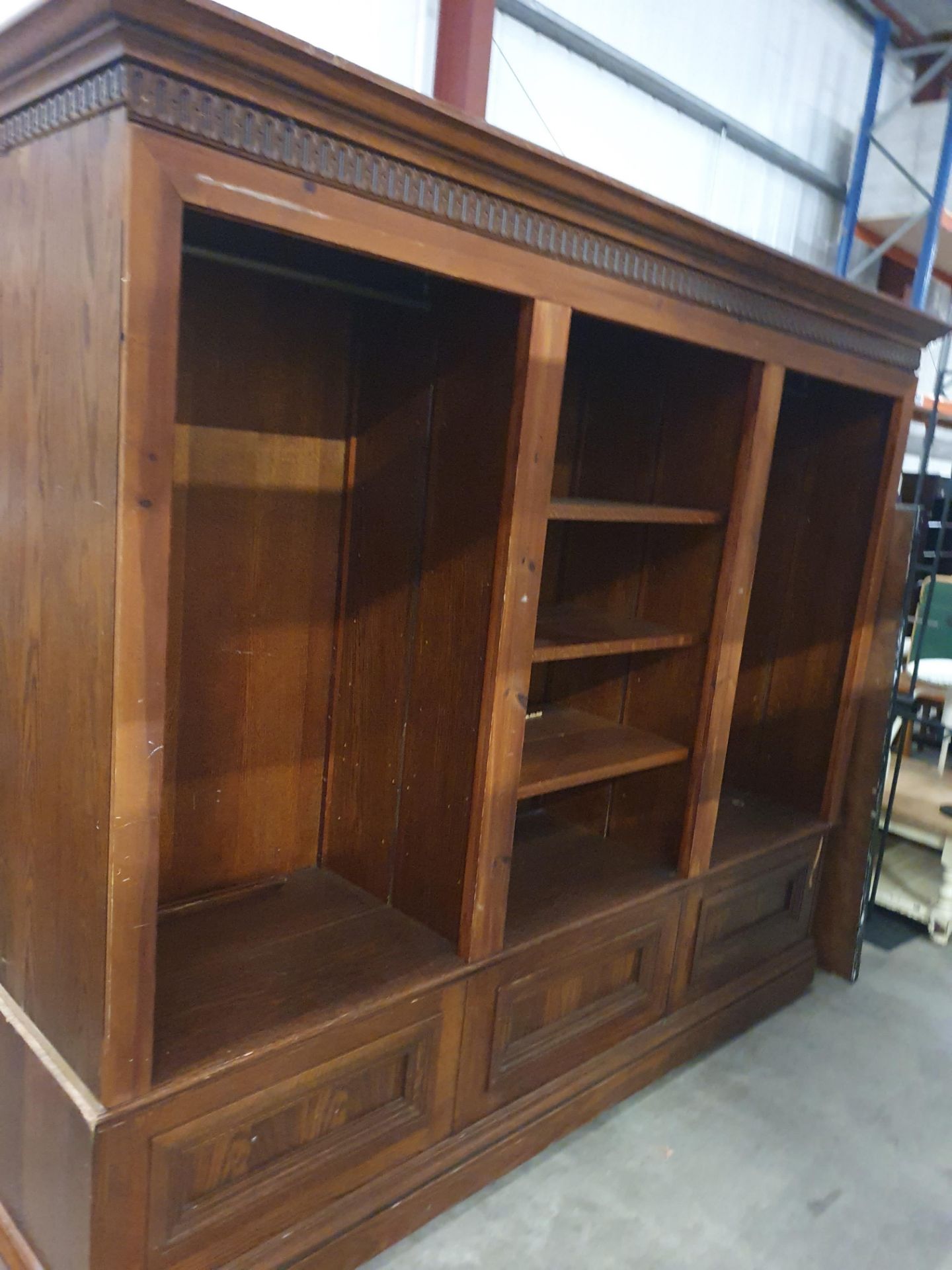 * Large solid wooden bookcase/display unit - with 2 hanging rails 2400w x 600d x 2050h - Image 4 of 4
