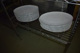 *Twenty-Four White Oval Plates