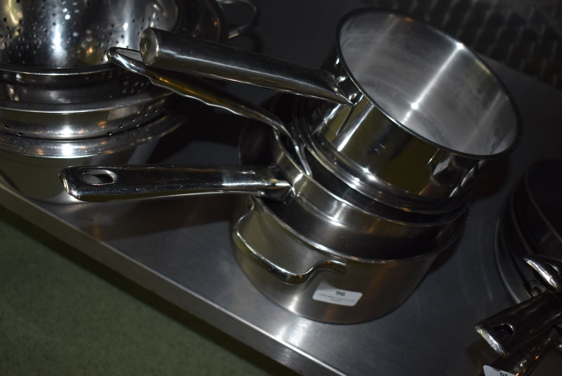 *Four Stainless Steel Saucepans