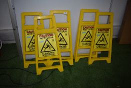 *Five Caution Wet Floor Signs