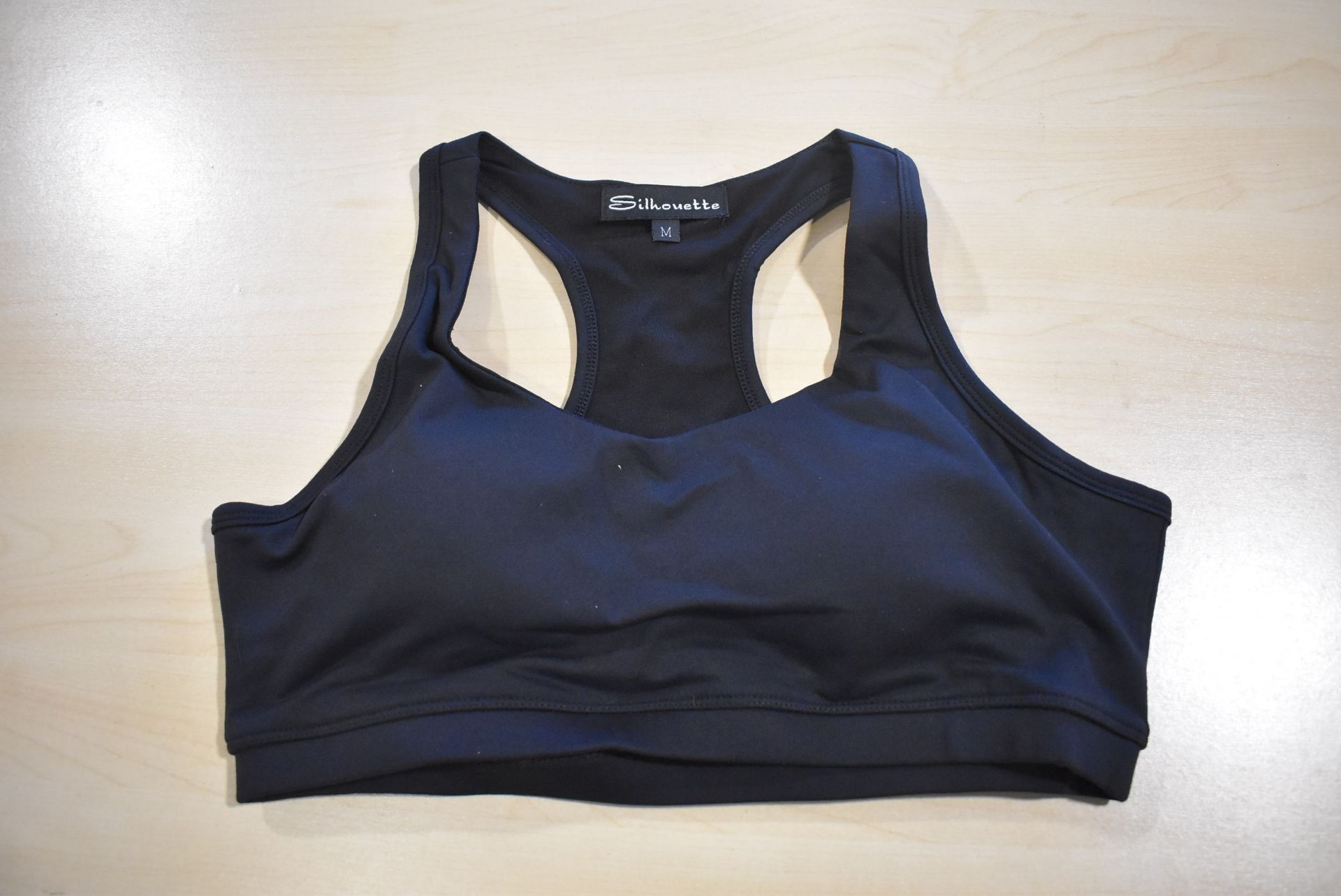 *Four Silhouette Sports Bras Size: M