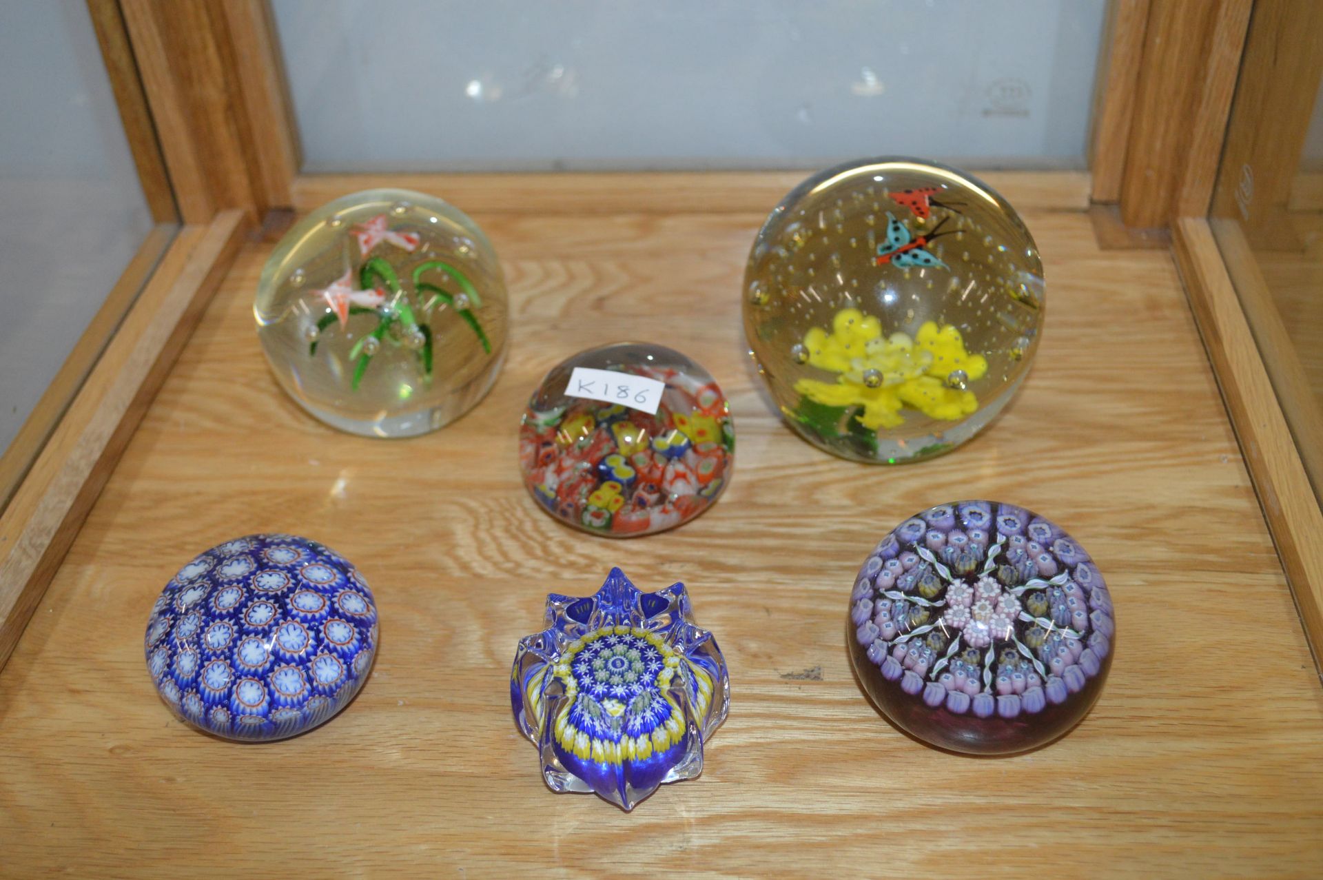 Six Glass Paperweights