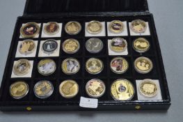 Display Case Containing 24 Commemorative Royal Coi