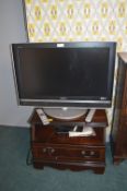 Sony Bravia 32" TV (salvage), and a TV Stand