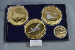 Four Concord Gold Plated Commemorative Coins