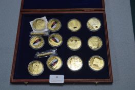 Display Case Containing 12 William and Kat Commemo