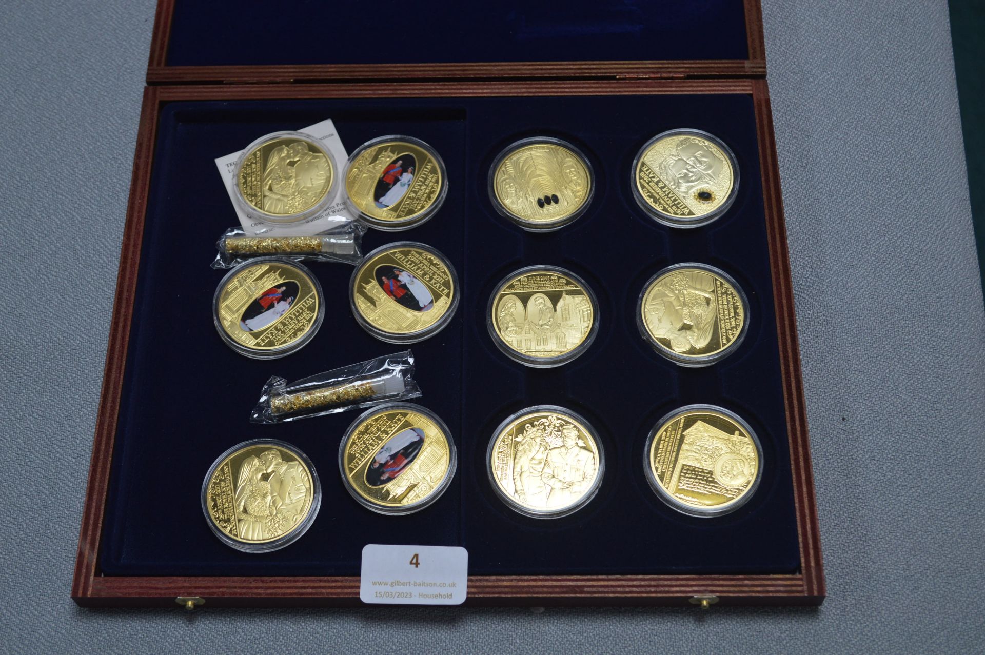 Display Case Containing 12 William and Kat Commemo