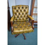 Mustard Leather Chesterfield Swivel Armchair