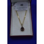 9k Gold Chain & Pendant with Garnet ~6g gross