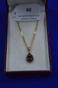 9k Gold Chain & Pendant with Garnet ~6g gross