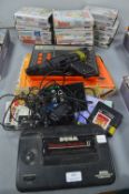 Sega Master System 2 Power Base plus Game Cassettes, and a Binatone TV Master Mk.6