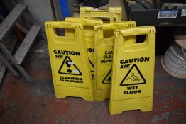 *Five Wet Floor Signs