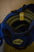 *Vented Bag Containing a Quantity of Suction Hose