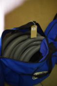 *Vented Bag Containing a Quantity of Suction Hose