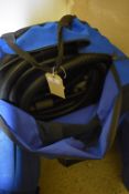 *Vented Bag Containing Suction Hose and Other Hoses