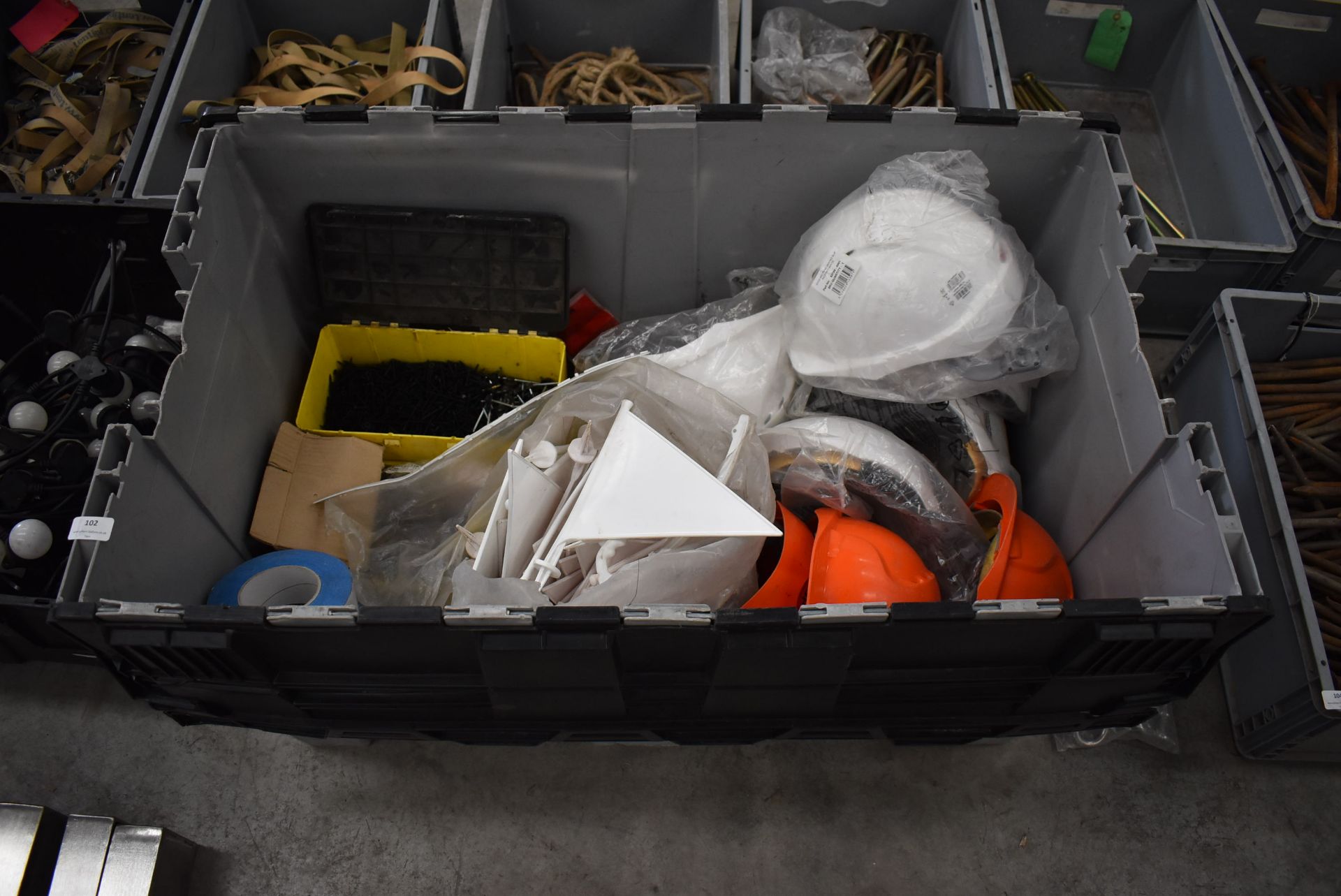 Box of Assorted Hardhats, Roofing & Dry Wall Screws, Double Sided Table, Plastic Flags, etc.