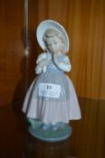 Lladro Nao Figurine of a Young Girl with Flowers