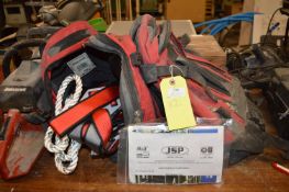 Two Harnesses in Backpacks