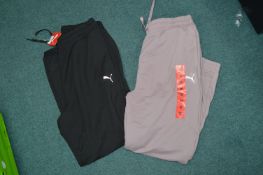 *Two Puma Track Bottoms Size: M
