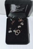 Four Pairs of Sterling Silver Ear Studs