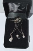 Three Sterling Silver Pendants with Two Chains