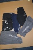 *Six Calvin Klein Joggers Size: S