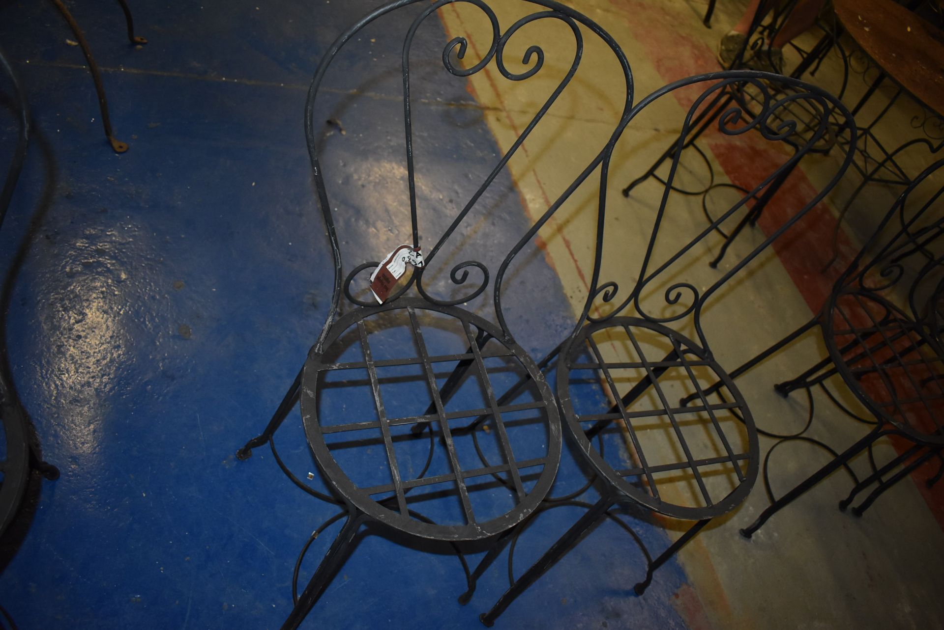 *Pair of Wrought Iron Bistro Chairs