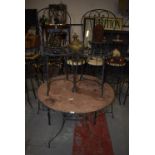 *Wrought Iron Circular Table with Four Bistro Chairs