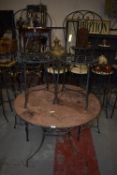 *Wrought Iron Circular Table with Four Bistro Chairs