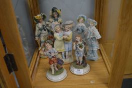 Seven Continental Painted Porcelain Figures