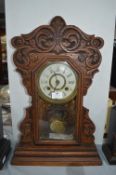 New Haven Gingerbread Carved Eight Day Mantel Clock in Working Condition with Key & Pendulum