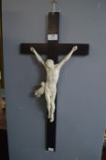 Ceramic Figure of Christ on an Ebonised Crucifix