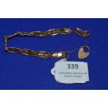 9k Gold Bracelet with Locket 8.23g