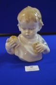 German Figure of a Child with an Apple