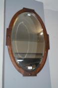 Carved Oak Framed Oval Beveled Edge Mirror