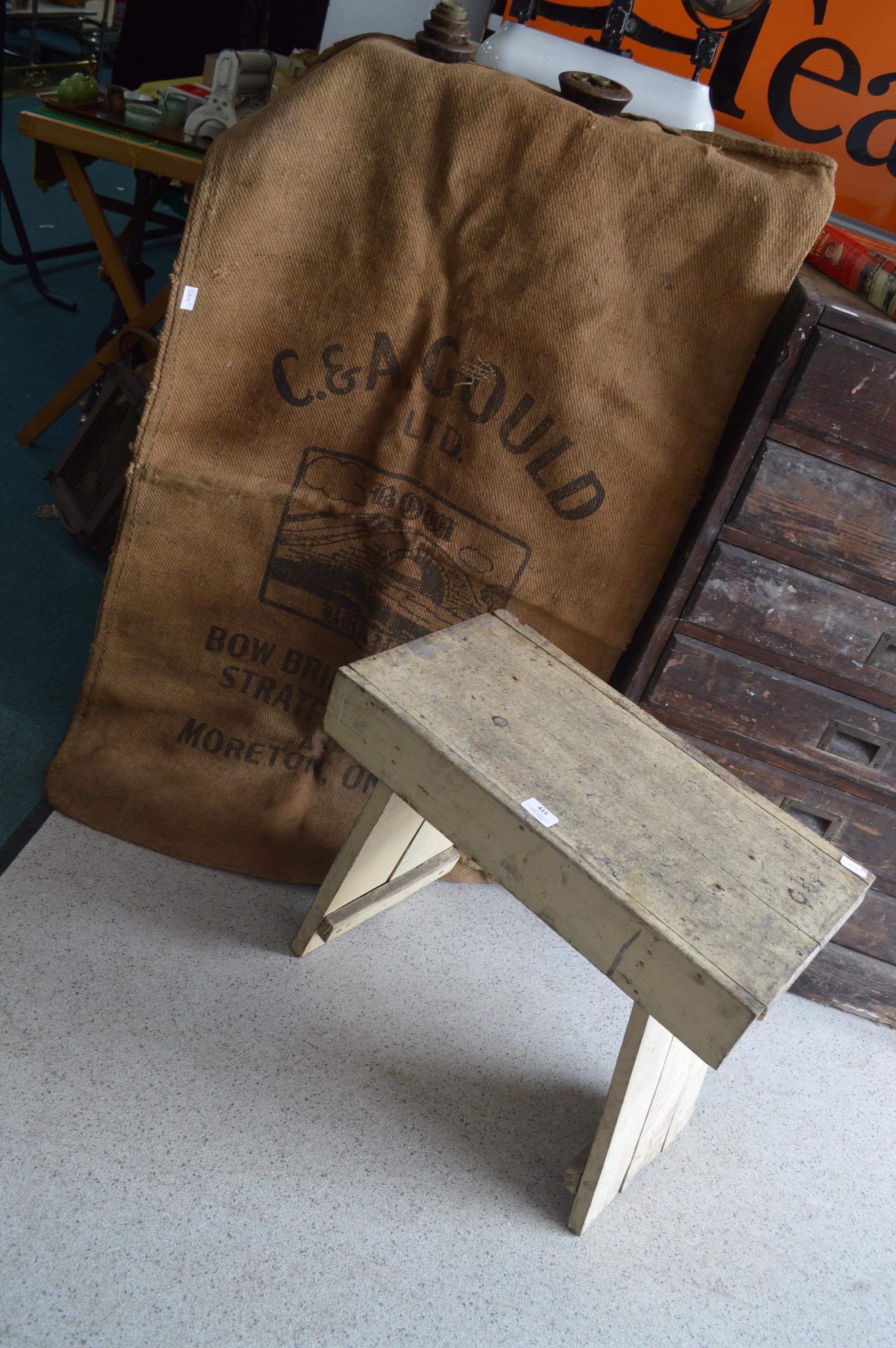 Rustic Painted Stool plus Large Hessian Advertisin