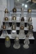 Fifteen Decorative Glass Sugar Shakers with EPNS Tops