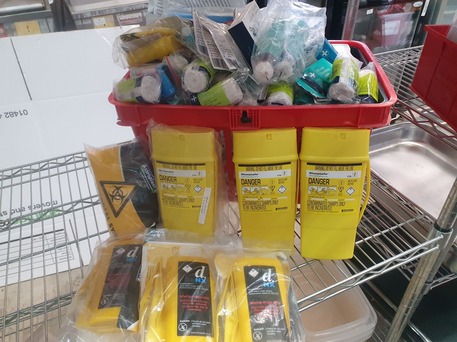 * large quantity of first aid items and sharps boxes. Bandages, plasters, wipes, eye solution, etc