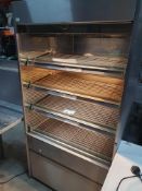 * Heated grab and go with 3 movable and base shelves on castors with light and night blind. Tested