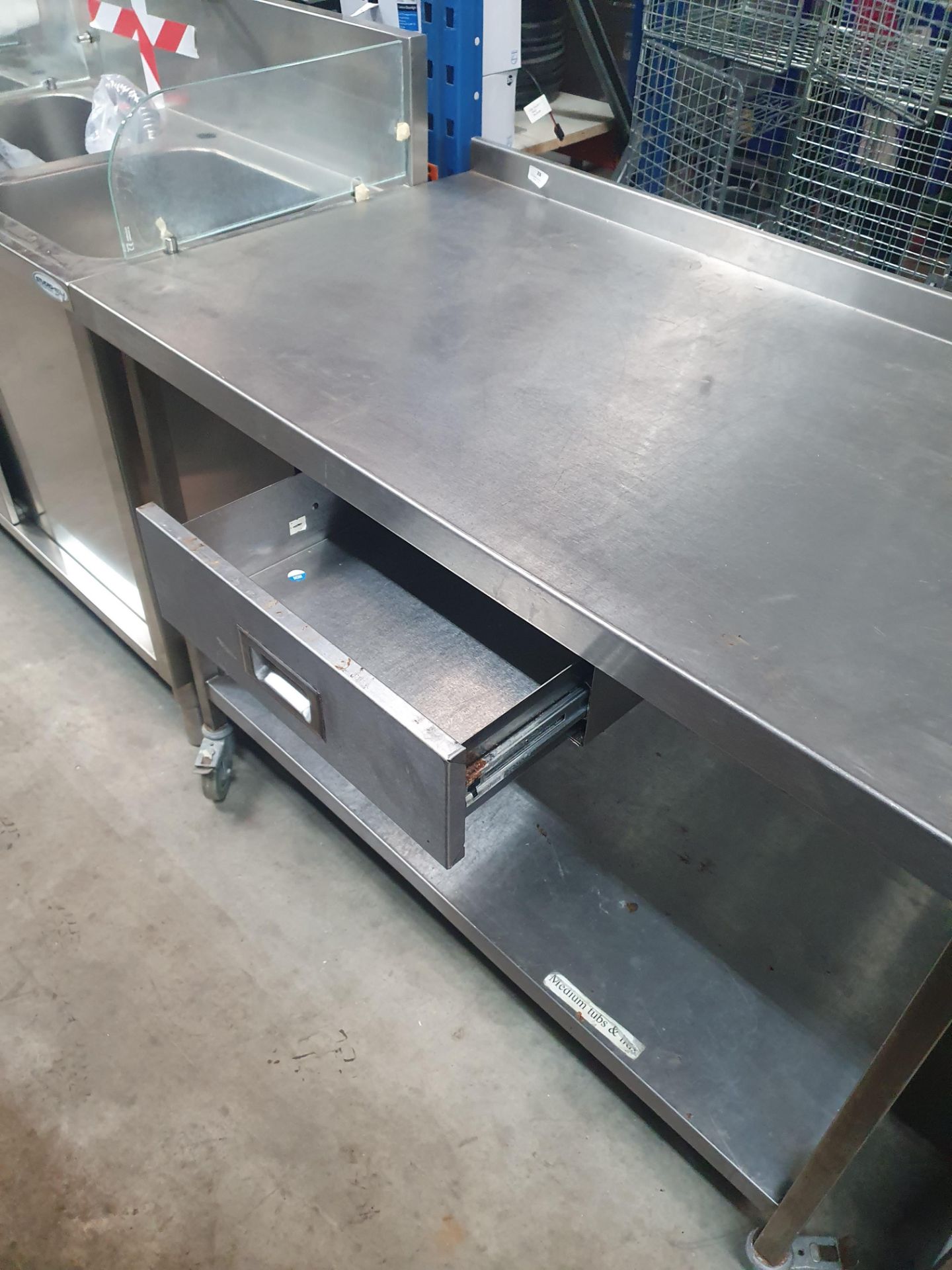 * S/S prep bench on castors with drawer and undershelf. 1250w x 700d x 940h - Image 2 of 2