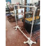 * white tubular with cast iron base clothes rail