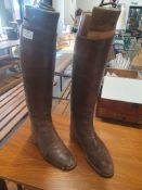 * leather boots with wooden boot shape holders